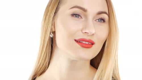 Attractive Woman in Beautiful Dress Smiling, on White, Close Up