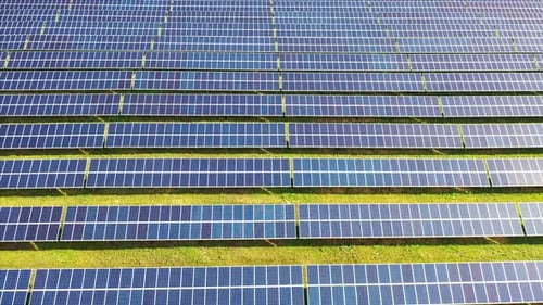 Footage of a Solar Panels Stand in a Row in the Fields Green Energy Electrical Power Ecology