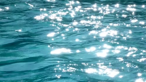 Water Background Surface Small Waves. Close Up