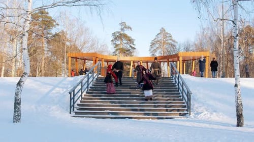 Russian Folk - Women in Bright Scarves Are Dance with Men on the Stairs