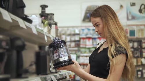 Woman Shopping for Kitchen Appliances