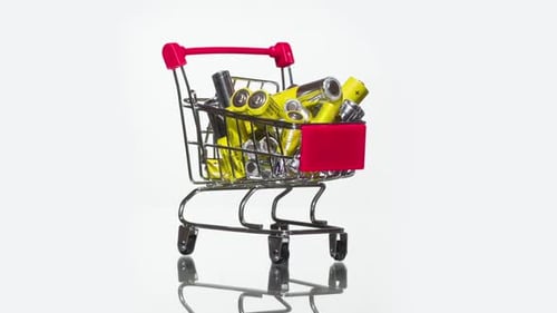 Mini Shopping Cart Full of Batteries Close-Up