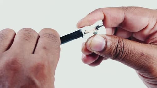 Sharpening Black Pencil