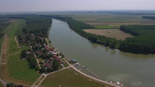Aerial View of River and Rural Village Landscape