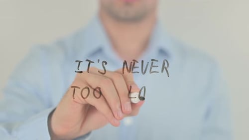 Adult Writing "It's Never Too Late"