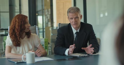 Business Meeting in a Bright Modern Office