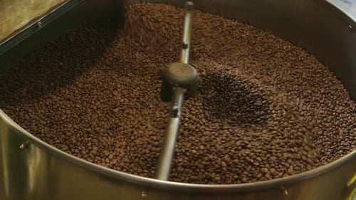 Coffee Beans Being Roasted in Roasting Machine