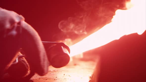 Torch being lit by sparker on anvil, Slow Motion Stock Footage ft ...