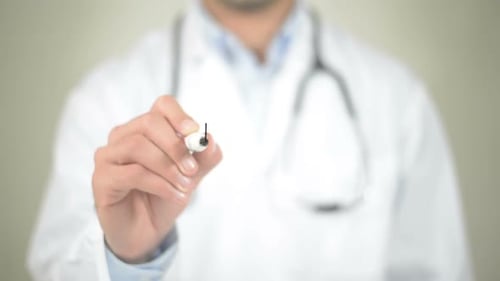 Doctor Writing Epidemic on Glass Surface