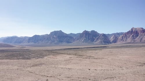 Desert Landscape with Red Rocks and Blue Sky