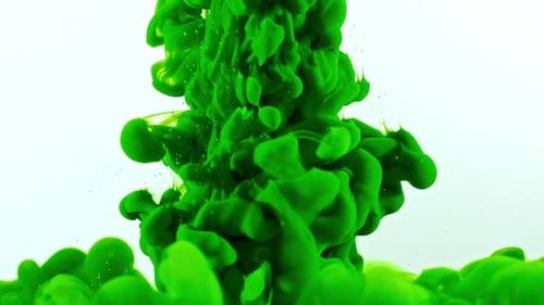 Green ink sprayed into tank of water
