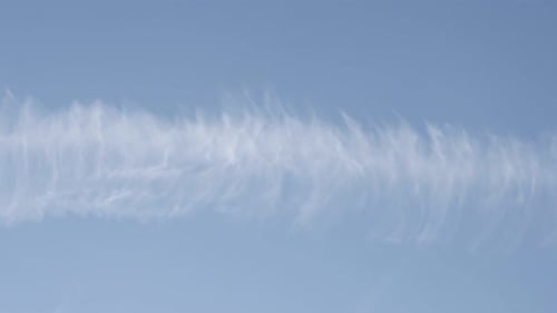 Artificial clouds remains from chemtrails behind aircraft 3840X2160 UHD footage - Water-based cont