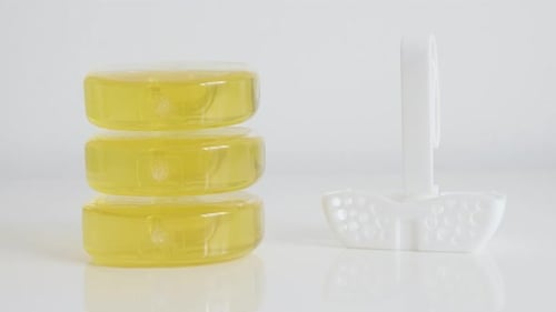 Liquid toilet bowl air fresheners with their holder 4K video