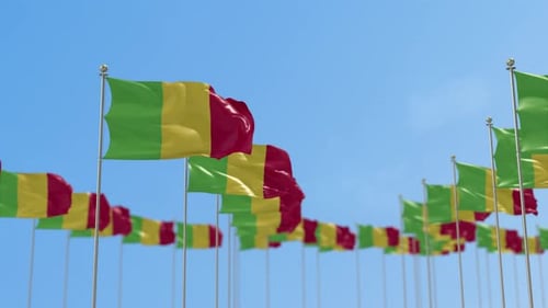 Realistic Mali National Flags Waving Against Blue Sky