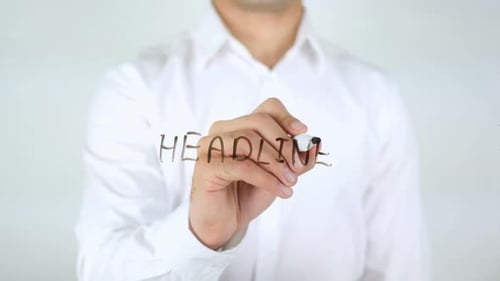 Headline Businessman Writing on Glass