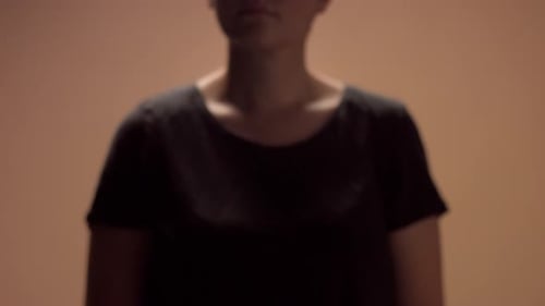 Unrecognizible Woman Out of Focus Her Hand Towards To the Camera To Focus Zone
