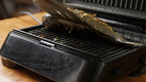 Turning Fish On The Grill