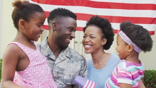 Loving Family Celebrates with Flags