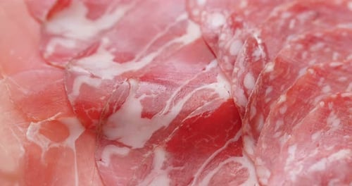 Close-Up of Sliced Cured Ham, Salami, and Coppa
