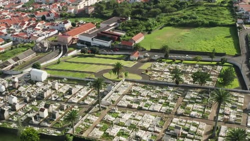 Aerial View of a Civil Cemetery with a Townscape Behind