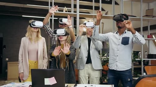Multiethnic Team Working on Virtual Screen Using for Job Special 3d Glasses