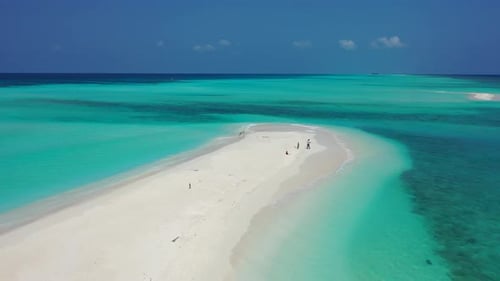 Natural flying copy space shot of a white paradise beach and turquoise sea background in high resolu