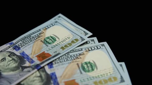 Counting American Dollar Banknotes Close Up