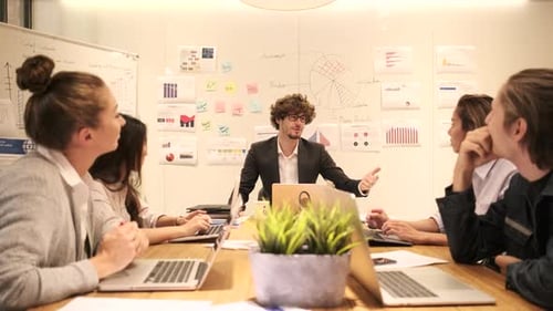 Meeting of multiracial professional teamwork with coworkers at the business office.