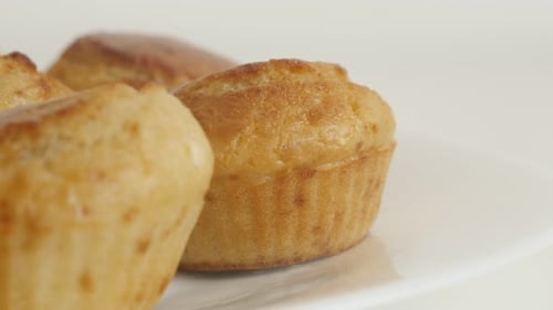 Evaporating steam from a hot muffin cornmeal 4K 2160p 30fps UltraHD footage - Freshly baked cornbr