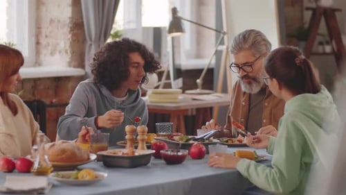 Family Enjoying Meal Together at Home