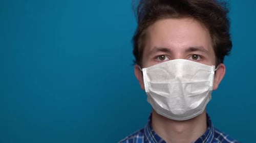 Boy Feeling Sick and Wearing Mask