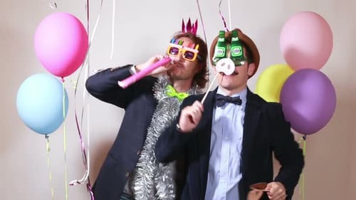 Two Friends Celebrate Birthday with Balloons and Fun