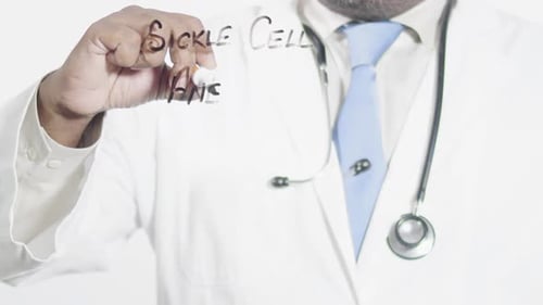 Doctor Writing Sickle Cell Anemia Diagnosis