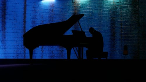 Stylized Piano Player Silhouette with Moody Blue Lighting Animation
