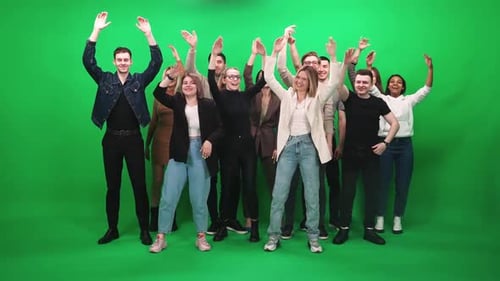 Enthusiastic Group Raising Arms on Green Screen