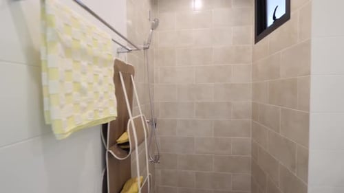 Clean Bathroom Interior with Shower and Organization