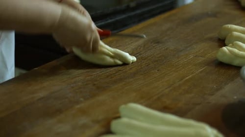 Confectioner Making Buns.