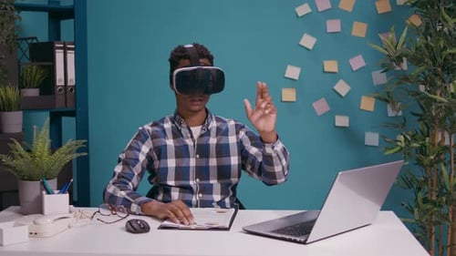 Man Wearing VR Headset Interacting with Virtual World