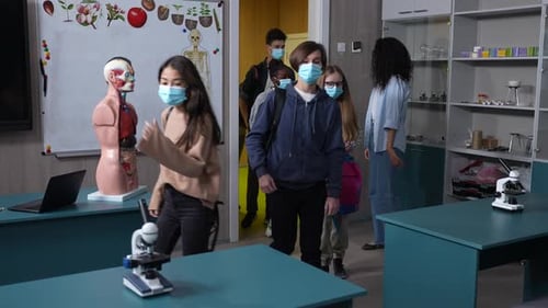 Students Enter Classroom Wearing Face Masks