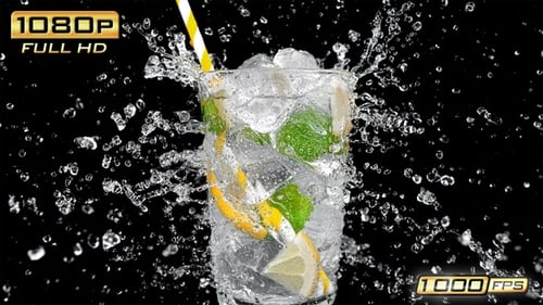 Refreshing lemonade with ice, mint and lemon splashes