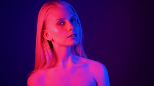 Woman in Neon Lighting: Beauty and Fashion Portrait