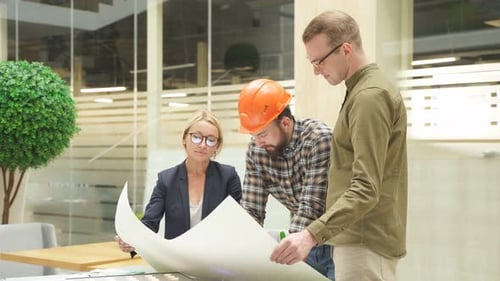 Engineers Coworking in Office Discuss Building Complex Prototype Project