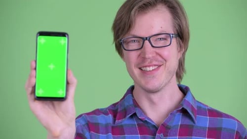 Young Adult Showing Phone with Green Screen