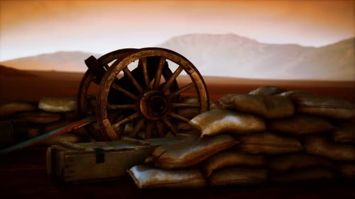 Vintage Cannon Wheels and Sandbags on a Desert Battlefield