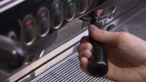 Espresso Machine Dispensing Beverage into Cup