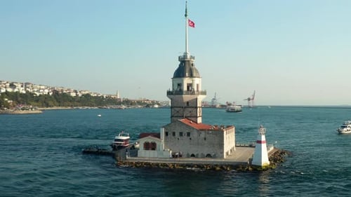 Circling Maiden's Tower with Turkey Flag in the Bosphorus Ocean River in Istanbul in Beautiful