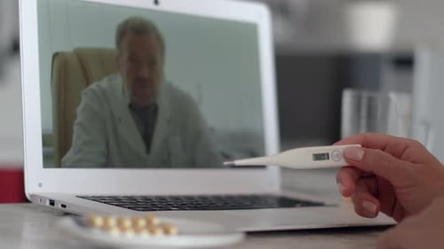 Woman Has Telemedicine Appointment With Doctor