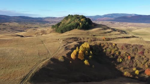 Aerial Drone View of Countryside Hills, Autumn Meadow by Drone. Transylvania, Romania