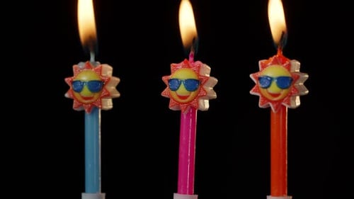 Birthday Candles with Sun Wearing Sunglasses Blown Out