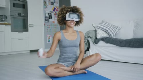Woman Doing VR Fitness at Home